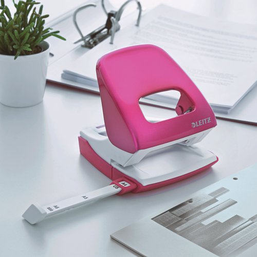 Leitz NeXXt metal punch in striking WOW colours that let your personality shine through. 2 hole punch for everyday use. Robust and reliable with a punching capacity of 30 sheets of 80gsm paper. Patented easy slide-in grip zone and ultra sharp stamps reduce punching effort. Metallic pink. Buy any 3 WOW products and claim a free Leitz Cosy Footrest.