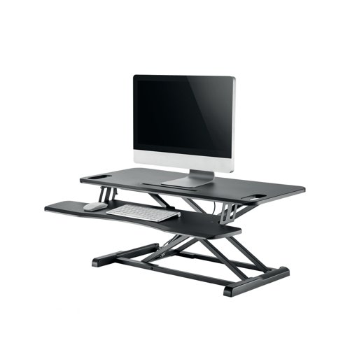 The Neomounts Sit/Stand Desktop Workstation converts a table top into a healthy sit/stand workstation. This workstation includes a spacious upper display surface and lower keyboard and mouse desk. It features spring-assisted lift mechanism that lets you switch easily between sitting and standing in just a few seconds. The ergonomic workstation offers maximum comfort, freedom of movement and productivity. It holds up to 15kg, while staying steady and solid at any height. Simple to start enjoying the health benefits of standing while you work. No assembly required comes ready to use out of the box.