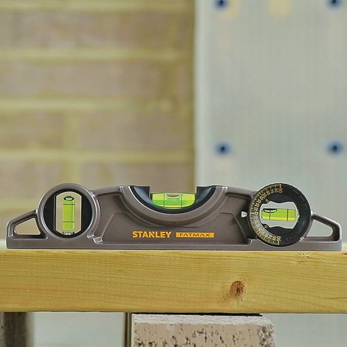 SB43609 | The Stanley Fatmax Magnetic Torpedo Level is ideal for a wide range of tasks from putting a shelf up to checking how level bricks are in a new wall. Measuring only 250mm this handheld level is easy to use and a simple way to maintain accuracy on the job. Magnified centre vail indicate when the bubble is centred showing the user that it is level. This Fatmax level has a 180 degree rotating vial, which can be easily adjusted to level variable angles. Earth magnets enable this level to stay connected to the subject to allow handsfree working, while the magnified centre bubble makes it clear to see.
